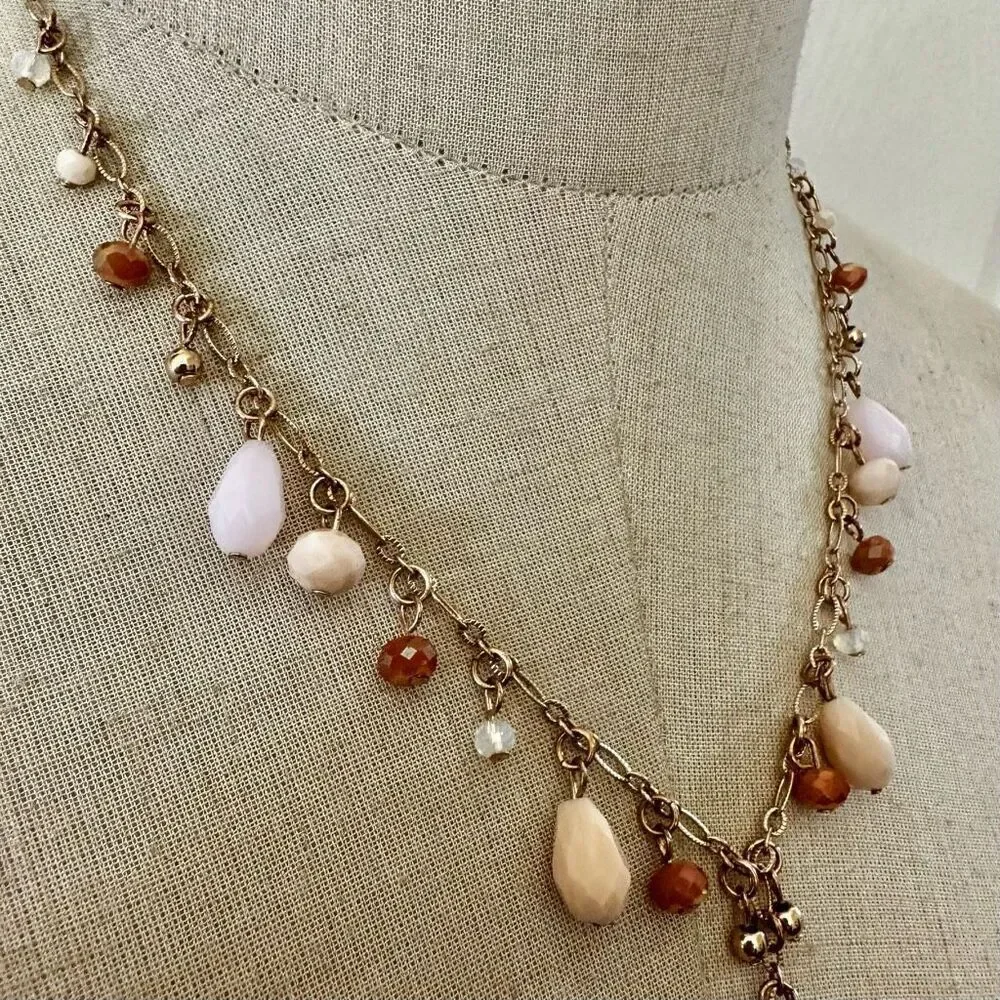 AA  gold tone long beaded Y necklace